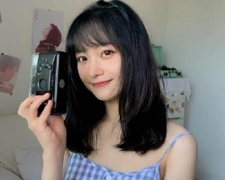 美艳风锁骨烫发型 性感女人味十足