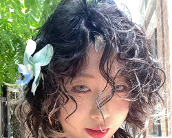 最新女生卷发范本 复古个性莱斯利卷