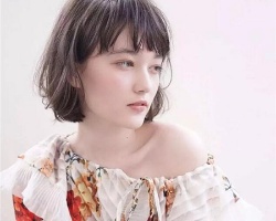 线条烫短发正流行 款款制造高回头率