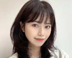 气质C字卷锁骨发 款款时尚好感度满分