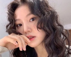 显发量羊毛卷造型 时髦大气展现女神范